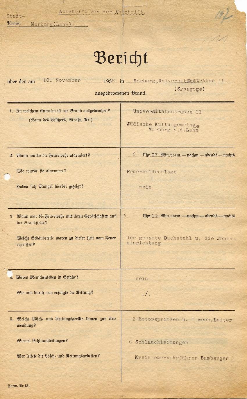 Kreisfeuerwehrführer Bamberger, Marburg, mit dem Bericht über den am 10. November 1938 in der Marburger Synagoge ausgebrochenen Brand. Marburg, 11. November 1938